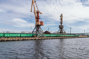 Train wagons at the port coal terminal at loading