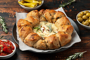 Baked Camembert cheese with onion bread