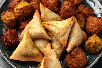 Indian Style Snack Selection with onion bhajis, pakoras and samosas