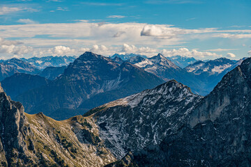 Majestic Alpine Peaks Glowing Under Autumn Skies Along Tannheimer Valleys Epic Hiking Trail