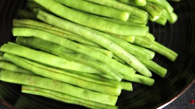 Green beans raw fresh vegetable string bean healthy food ingredient appetizer fresh tasty gourmet food background on the table rustic top view copy space keto and paleo diet vegetarian and vegan food