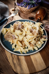 Pasta with sauerkraut and meat.