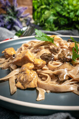 Italian pasta with chicken and mushrooms.