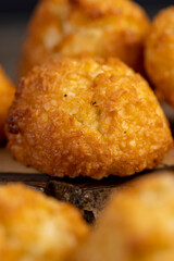 sweet cookies with coconut pieces are on the table, a group of sweet and delicious freshly made cookies for a tea