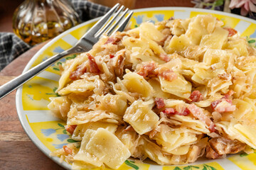 Pasta with sauerkraut and bacon.