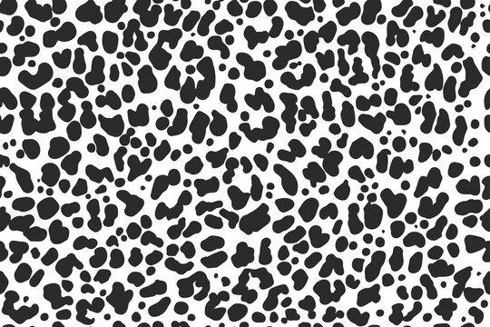 Leopard skin seamless texture with irregular black spots. Safari animal motif for fashion fabric. Abstract dotted background with organic shapes for wallpaper and textile. Vector
