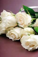 Romantic still life of white roses bouquet symbolizing love and celebration