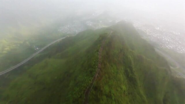 Majestic view from a Hawaiian mountain peak above theclouds.