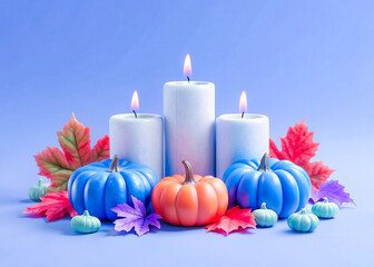 a group of candles and fall leaves