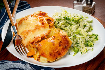 Stuffed pancake baked with cheese.