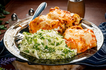 Stuffed pancake baked with cheese.