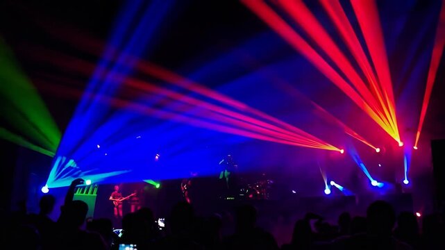 A lively nightlife scene featuring a dynamic light show with bright, colorful beams illuminating a crowded dance floor. silhouetted partygoers enjoy the energetic atmosphere, capturing the essence of 