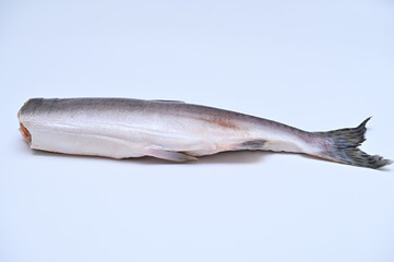 wild raw salmon gutted for cooking on white background