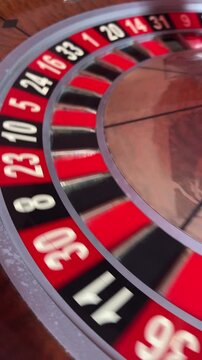 Close-up of a casino roulette wheel. 