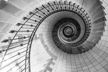 Black and white photo inside staircase lighthouse - France