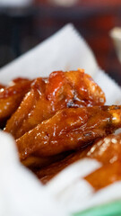 Buffalo Chicken Wings in Basket at Restaurant
