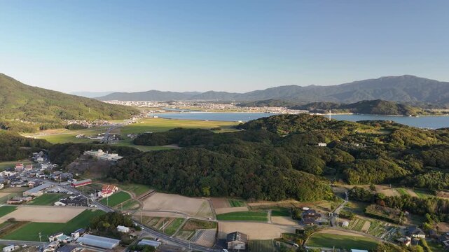 Shimakishi, Itoshima, Fukuoka, Japan Coastline in Autumn: 4K Aerial Drone Footage of Hikizu Bay, Rural Beach, Islands, Mountain Forests, Fish Cage, Houses, Estates near Genkai Quasi-National Park