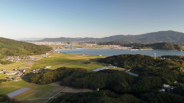 Shimakishi, Itoshima, Fukuoka, Japan Coastline in Autumn: 4K Aerial Drone Footage of Hikizu Bay, Rural Beach, Islands, Mountain Forests, Fish Cage, Houses, Estates near Genkai Quasi-National Park