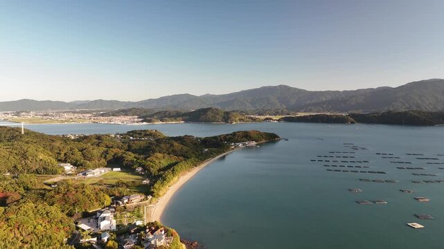 Shimakishi, Itoshima, Fukuoka, Japan Coastline in Autumn: 4K Aerial Drone Footage of Hikizu Bay, Rural Beach, Islands, Mountain Forests, Fish Cage, Houses, Estates near Genkai Quasi-National Park
