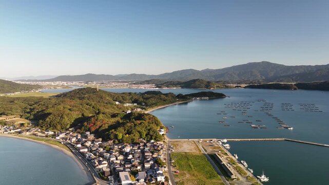 Shimakishi, Itoshima, Fukuoka, Japan Coastline in Autumn: 4K Aerial Drone Footage of Hikizu Bay, Rural Beach, Islands, Mountain Forests, Fish Cage, Houses, Estates near Genkai Quasi-National Park