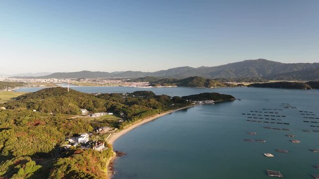 Shimakishi, Itoshima, Fukuoka, Japan Coastline in Autumn: 4K Aerial Drone Footage of Hikizu Bay, Rural Beach, Islands, Mountain Forests, Fish Cage, Houses, Estates near Genkai Quasi-National Park