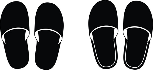 A simple illustration depicting four black slippers in a top down view