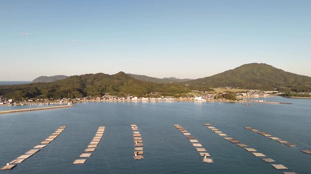 Shimakishi, Itoshima, Fukuoka, Japan Coastline in Autumn: 4K Aerial Drone Footage of Hikizu Bay, Rural Beach, Islands, Mountain Forests, Fish Cage, Houses, Estates near Genkai Quasi-National Park
