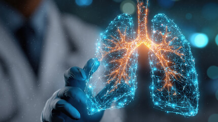 Doctor holding virtual holographic projection of human lungs with digital interface in medical research setting