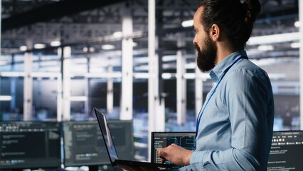 Server hub admin using AI LLM chatbot to review hardware diagnostics. IT expert in data center...