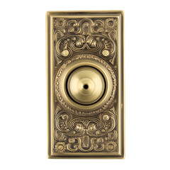 Polished brass doorbell with ornate classical design and intricate engravings on transparent background