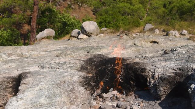Antalya, &Ccedil;ıralı: Yanartaş (Chimera) in Olympos National Park. A natural methane gas flame that emerges from the rocky slope without extinguishing. A legendary and geological natural beauty.