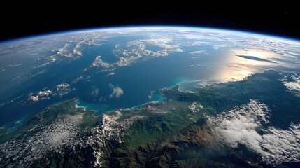 Fototapeta premium A beautiful view of the Earth from space. The sky is filled with clouds and the ocean is visible in the distance. Concept of awe and wonder at the vastness of the universe
