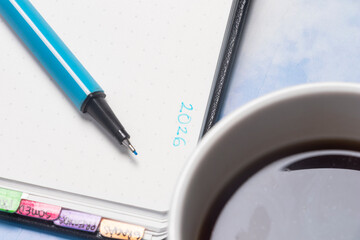 The Process of Planning: Close-up of Handwriting and Daily Routine Essentials