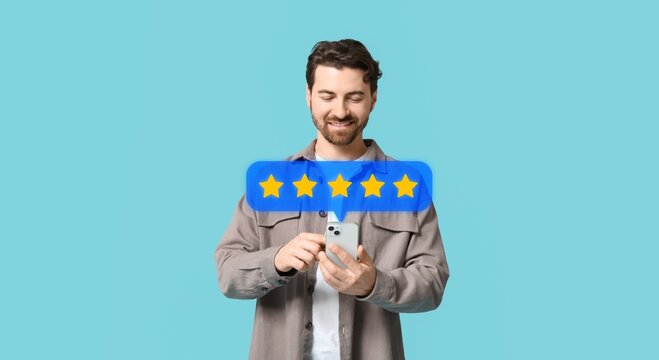 Man with mobile phone giving feedback on blue background