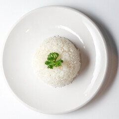 Top view of steamed white rice served in a minimalist bowl with parsley garnish. Clean high key food photography with copy space, ideal for healthy eating, Asian cuisine, diet or menu design