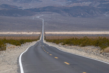 Straight Desert Highway Leading into Death Valley National Park