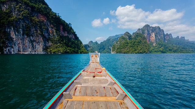 Explore the tranquility of cheow lan lake in khao sok thailand