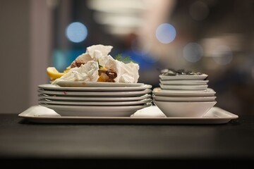 Plates, used dishes in a pile