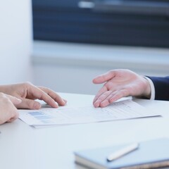 The picture shows two hands gesturing to welcome or invite.