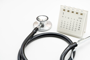 Medical Appointment Concept with 2026 JANUARY Calendar and Stethoscope. symbolizing healthcare appointments, medical checkups, and patient consultation scheduling. Copy space.