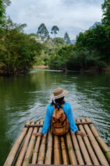 Explore the serene beauty of Khao Sok Thailand on a bamboo raft adventure
