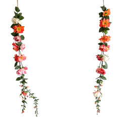 Fototapeta premium Cascading Flower Garlands With Pink Orange And White Blossoms And Green Leaves Hanging Vertically Against A White Background