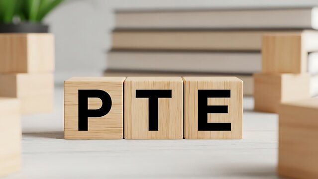 Pte wooden blocks representing the pearson test of english for study abroad and immigration