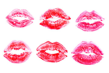Set of red lipstick kiss imprint on white background.