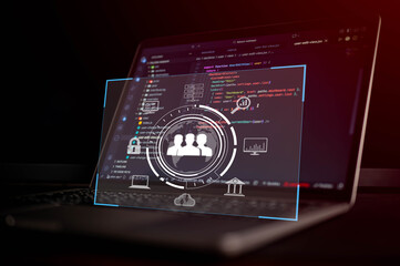 User interface icon with team management and data analytics symbol overlay on laptop screen showing source code, representing digital transformation and cybersecurity in software development.