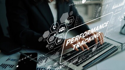 Business Professional Engaged in Performance Tracking with Data Visualizations and Analytics Tools in a Modern Office Setting. Asymptotic smart data analytic.