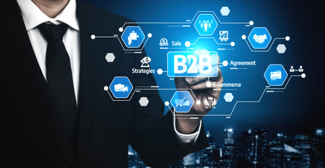 A businessman interacts with a digital tablet to visualize B2B concepts, highlighting e-commerce strategies and brand agreements in a modern technology-driven setting. Tessel