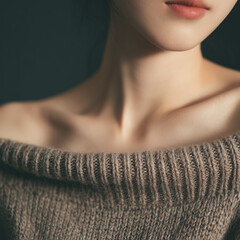 니트 상의와 쇄골의 클로즈업 디테일