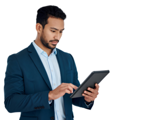 Smiling businessman in a suit standing in an office and holding a tablet computer while looking professional and confident