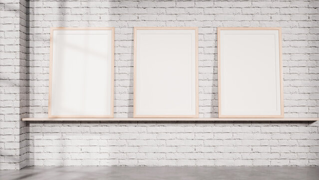 Three Frame Gallery Mockup on Shelf with White Brick Wall